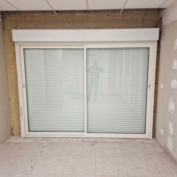 Rénovation châssis coulissant 2 vantaux sur 2 rails fabriqué par nos soins avec volet roulant monobloc